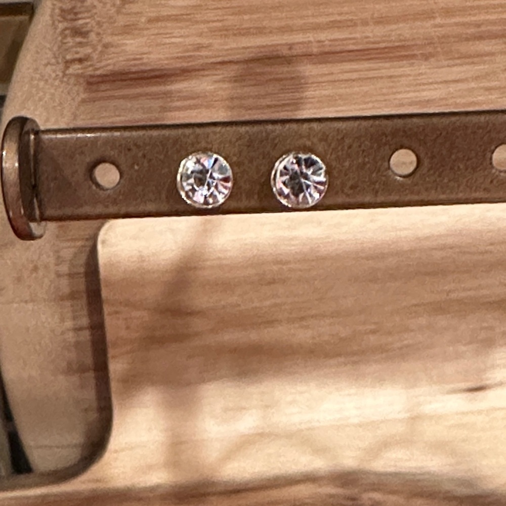 Stunning Crystal Stud Earrings with Goldtone Hardware. Smooth Modern Look